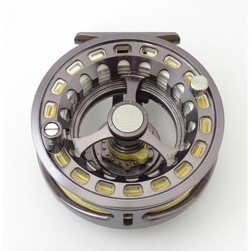 1124 - Fishing : a Hardy Ultralite 5000 CLS centrepin fly reel, together with a Hardy's neoprene case conta... 