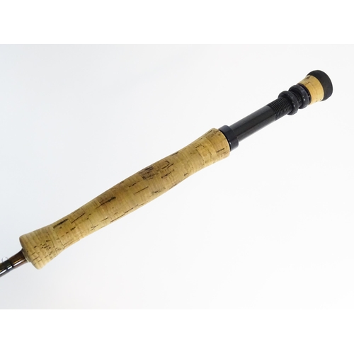 1128 - Fishing : a Sage (USA) 'XP 796 Graphite IIIe' two-piece fly rod, approx 114