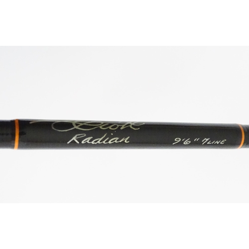 1129 - Fishing : a Scott (USA) 'Radian' carbon four-piece fly rod, serial number 402518, approx 114