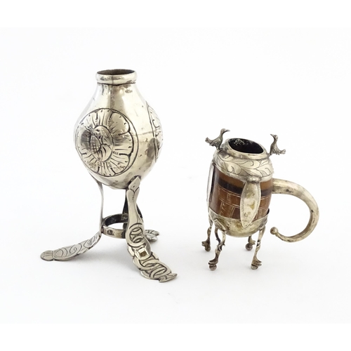 1076 - A mate pot with gourd / seed pod body and silver plate mounts with bird and foliate detail, with a m... 