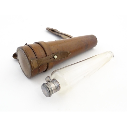 1079 - A mid 20thC leather cased hunting flask, of conical form, with silver mounts hallmarked 1937 Chester... 