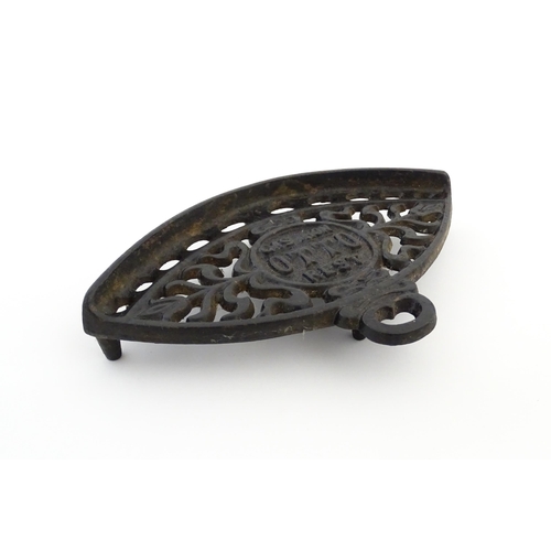 1112 - A late 19th / early 20thC Otto gas iron rest with stylised foliate detail, marked with patent no. 59... 