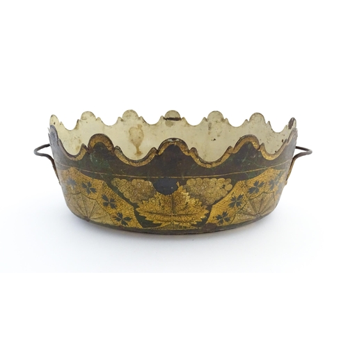 1113 - An early 19thC French tole peinte cachepot / planter / cooler with foliate decoration. Approx. 4 1/4... 