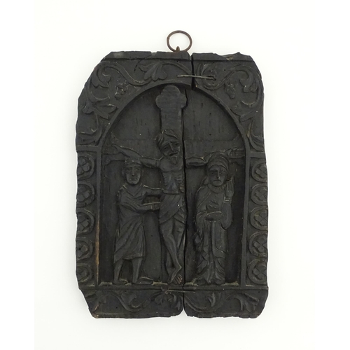 1116 - A naive carved wooden plaque depicting the crucifixion of Christ with the Virgin Mary and St. John, ... 