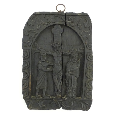 1116 - A naive carved wooden plaque depicting the crucifixion of Christ with the Virgin Mary and St. John, ... 