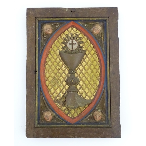 1117 - An early 20thC Continental tabernacle door with carved and polychrome decoration depicting a chalice... 