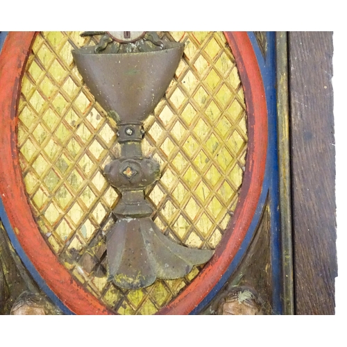 1117 - An early 20thC Continental tabernacle door with carved and polychrome decoration depicting a chalice... 