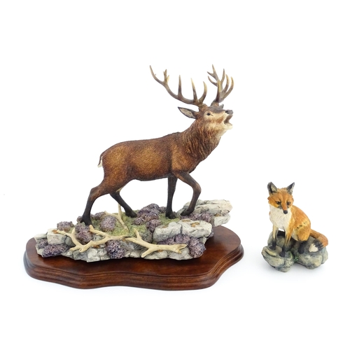 1120 - Two Border Fine Arts animal models comprising Highland Majesty B0220 by R. Roberts, and a seated fox... 