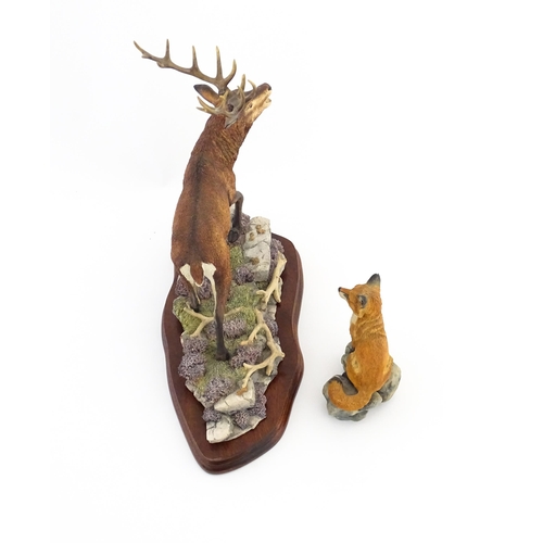 1120 - Two Border Fine Arts animal models comprising Highland Majesty B0220 by R. Roberts, and a seated fox... 