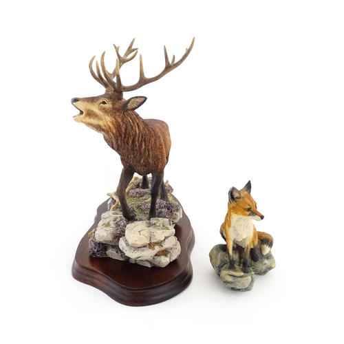 1120 - Two Border Fine Arts animal models comprising Highland Majesty B0220 by R. Roberts, and a seated fox... 