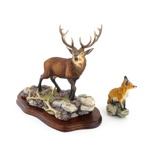 1120 - Two Border Fine Arts animal models comprising Highland Majesty B0220 by R. Roberts, and a seated fox... 