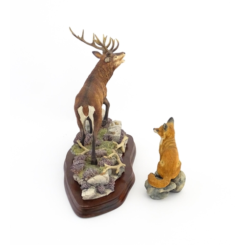 1120 - Two Border Fine Arts animal models comprising Highland Majesty B0220 by R. Roberts, and a seated fox... 