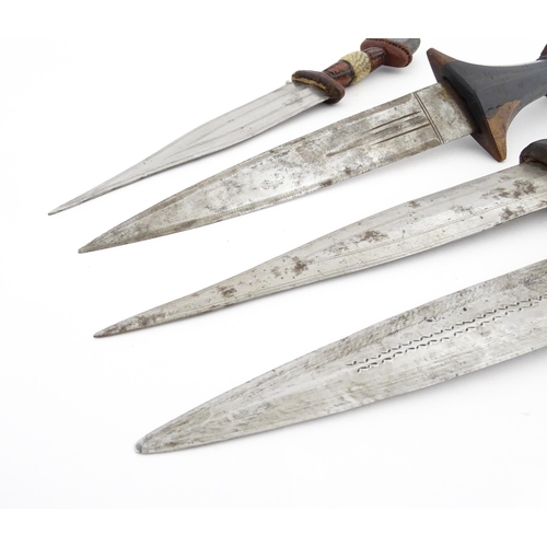 1138 - Ethnographic / Native / Tribal : Four assorted African / Sudanese arm knives / daggers, with leather... 