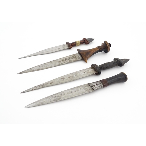 1138 - Ethnographic / Native / Tribal : Four assorted African / Sudanese arm knives / daggers, with leather... 