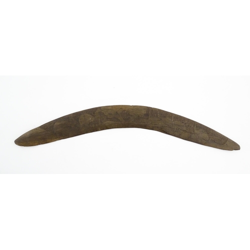 1140 - Ethnographic / Native / Tribal : A large Australian carved wooden boomerang with engraved decoration... 