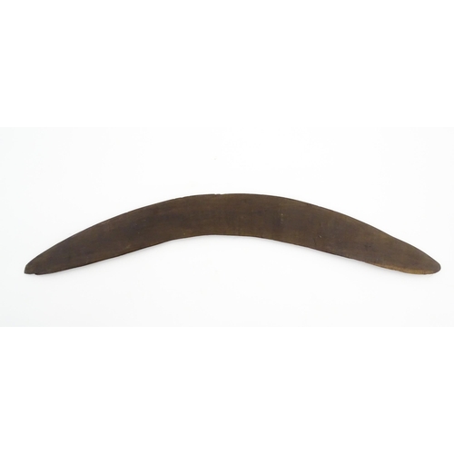 1140 - Ethnographic / Native / Tribal : A large Australian carved wooden boomerang with engraved decoration... 