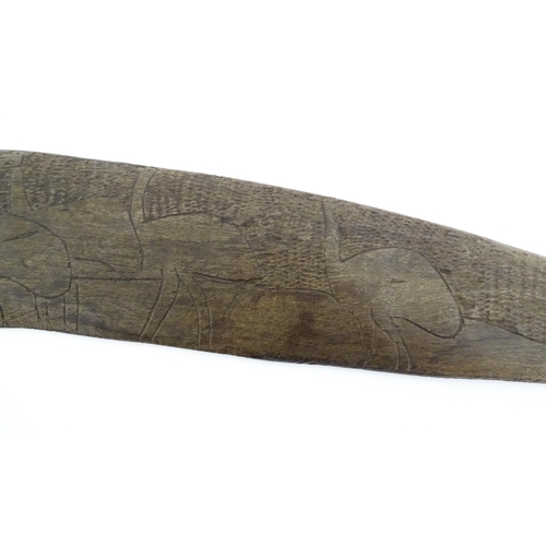 1140 - Ethnographic / Native / Tribal : A large Australian carved wooden boomerang with engraved decoration... 