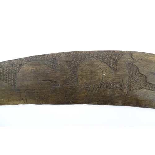 1140 - Ethnographic / Native / Tribal : A large Australian carved wooden boomerang with engraved decoration... 