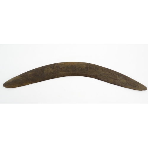 1140 - Ethnographic / Native / Tribal : A large Australian carved wooden boomerang with engraved decoration... 