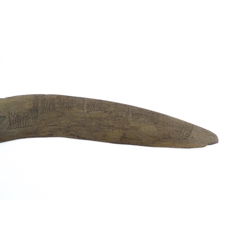 1140 - Ethnographic / Native / Tribal : A large Australian carved wooden boomerang with engraved decoration... 