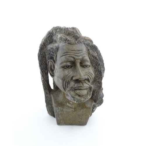 1148 - Ethnographic / Native / Tribal : An African carved soapstone bust modelled as a man with dreadlocks.... 