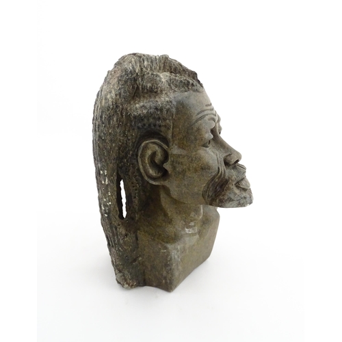 1148 - Ethnographic / Native / Tribal : An African carved soapstone bust modelled as a man with dreadlocks.... 