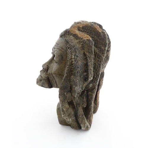 1148 - Ethnographic / Native / Tribal : An African carved soapstone bust modelled as a man with dreadlocks.... 