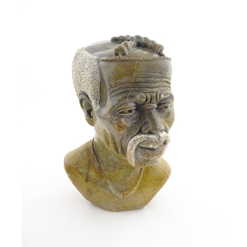 1149 - Ethnographic / Native / Tribal : An African carved soapstone bust modelled as a man with a moustache... 