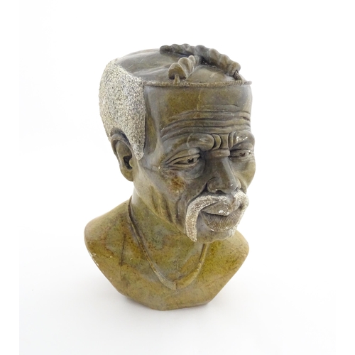 1149 - Ethnographic / Native / Tribal : An African carved soapstone bust modelled as a man with a moustache... 