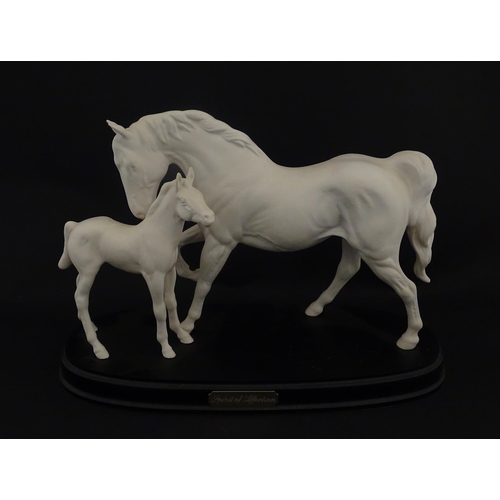 126 - A Royal Doulton model Spirit of Affection depicting white horse and foal. Marked under, and having p... 