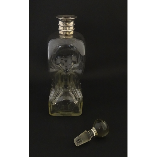 232 - A Victorian glass decanter with pinch detail and silver collar hallmarked Sheffield 1887 maker Marti... 