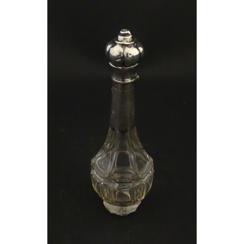 234 - A glass scent / perfume bottle with a Dutch silver top, c. 1810. Approx. 4 3/4