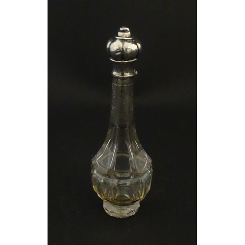 234 - A glass scent / perfume bottle with a Dutch silver top, c. 1810. Approx. 4 3/4