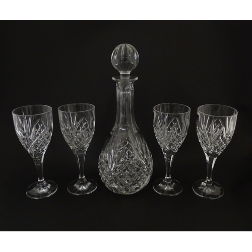 238 - Four cut glass wine glasses and decanter by Royal Doulton. Boxed. Decanter approx. 10 1/4