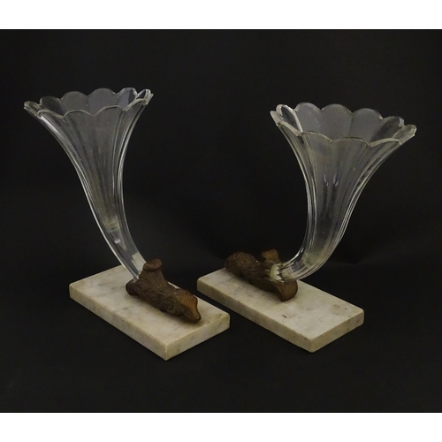 241 - A pair of Victorian epergnes the clear glass flutes with rams head support mounted on a rectangular ... 