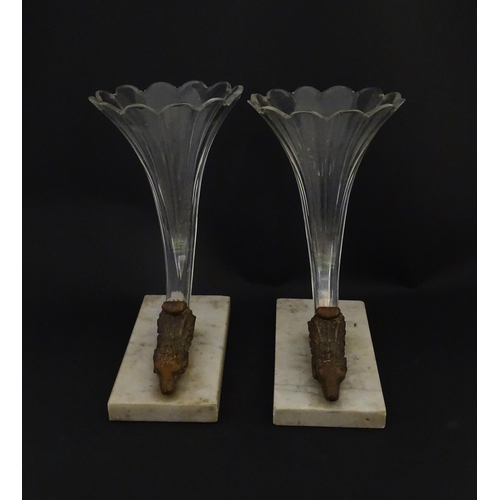 241 - A pair of Victorian epergnes the clear glass flutes with rams head support mounted on a rectangular ... 