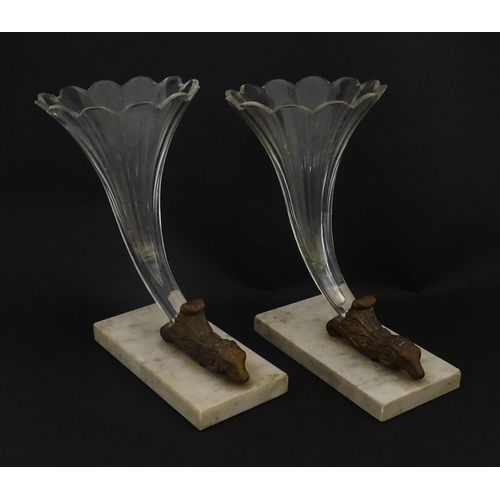 241 - A pair of Victorian epergnes the clear glass flutes with rams head support mounted on a rectangular ... 