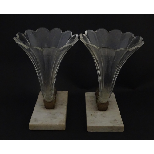 241 - A pair of Victorian epergnes the clear glass flutes with rams head support mounted on a rectangular ... 