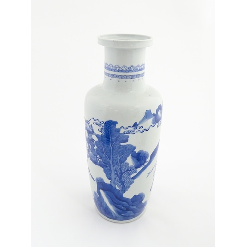 8 - A Chinese blue and white vase decorated with warriors and horses in a landscape. Character marks und... 