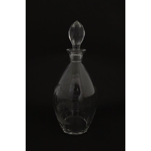 175 - A Rowland Ward glass decanter with engraved Safari animal detail. Unsigned  Approx. 11 1/4