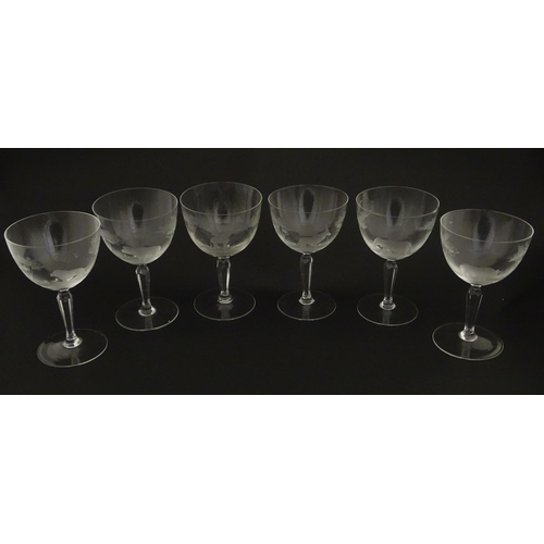 179 - Six Rowland Ward wine glasses with engraved Safari animal detail. Unsigned. Approx. 5 1/2