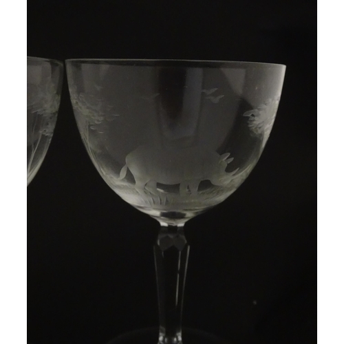 179 - Six Rowland Ward wine glasses with engraved Safari animal detail. Unsigned. Approx. 5 1/2