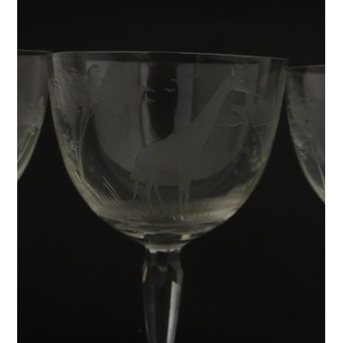 179 - Six Rowland Ward wine glasses with engraved Safari animal detail. Unsigned. Approx. 5 1/2