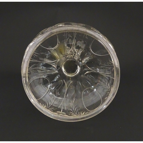 190 - A glass centrepiece bowl comport with engraved floral and foliate detail on a lobed pedestal foot. A... 