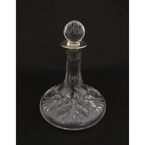 193 - A cut glass flask of small ships decanter form with silver collar hallmarked Birmingham 1988, maker ... 