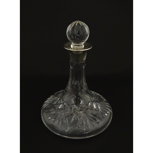 193 - A cut glass flask of small ships decanter form with silver collar hallmarked Birmingham 1988, maker ... 