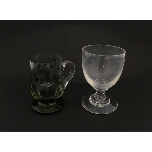 196 - A 19thC glass goblet / rummer. Together with a Continental tankard depicting hunting scene, figure o... 