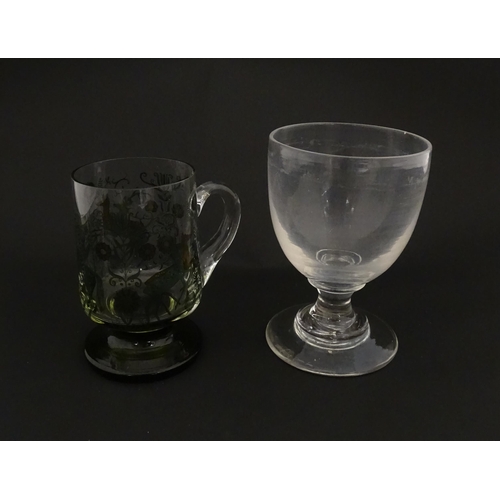 196 - A 19thC glass goblet / rummer. Together with a Continental tankard depicting hunting scene, figure o... 