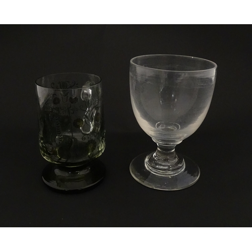 196 - A 19thC glass goblet / rummer. Together with a Continental tankard depicting hunting scene, figure o... 