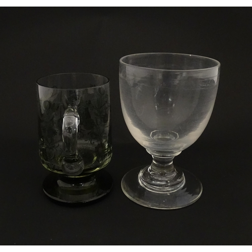 196 - A 19thC glass goblet / rummer. Together with a Continental tankard depicting hunting scene, figure o... 